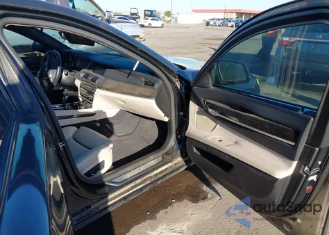 2012 BMW 750Li z USA, uszkodzony, nr VIN WBAKB8C57CC964815